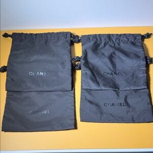 CHANEL 4 Black Drawstring Pouch